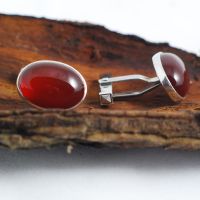 Silver cufflinks set with carnelian